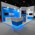 Modern custom exhibition booth designed by professional exhibition booth design services at a trade show