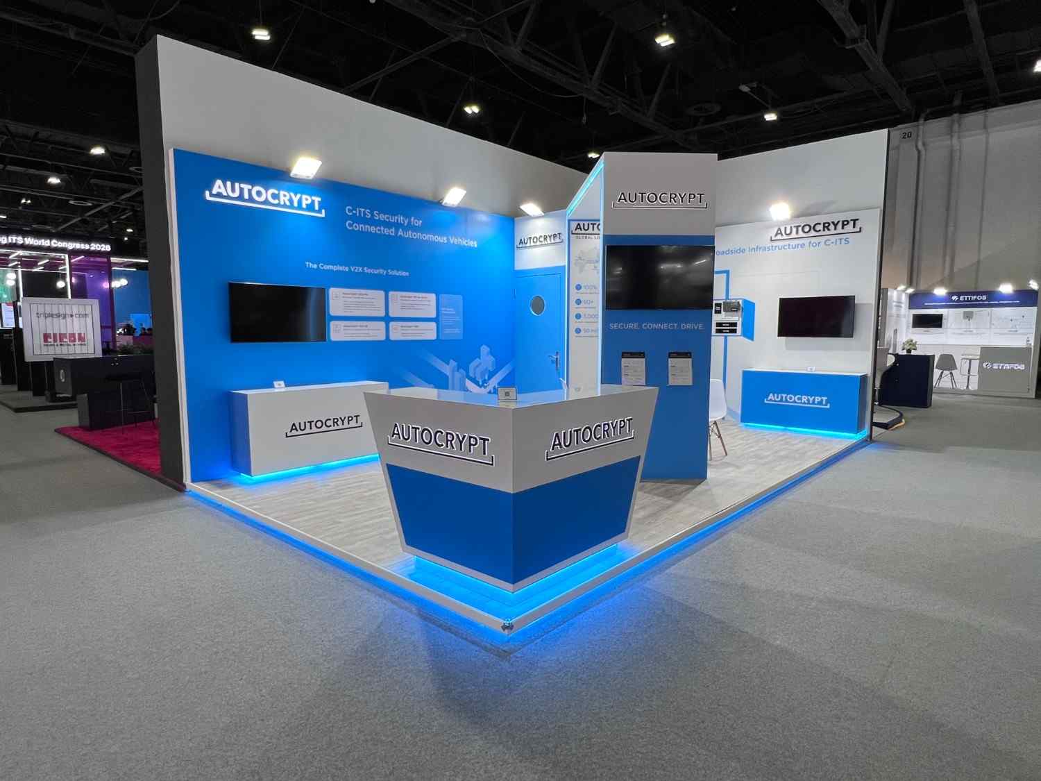 Modern custom exhibition booth designed by professional exhibition booth design services at a trade show