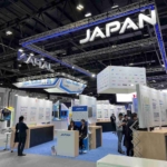 Custom exhibition stand contractors creating a branded trade show booth